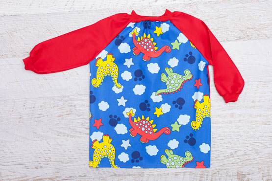 Dinosaur art smock with red sleeves