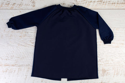 Large art smock in navy blue with long sleeves and open back